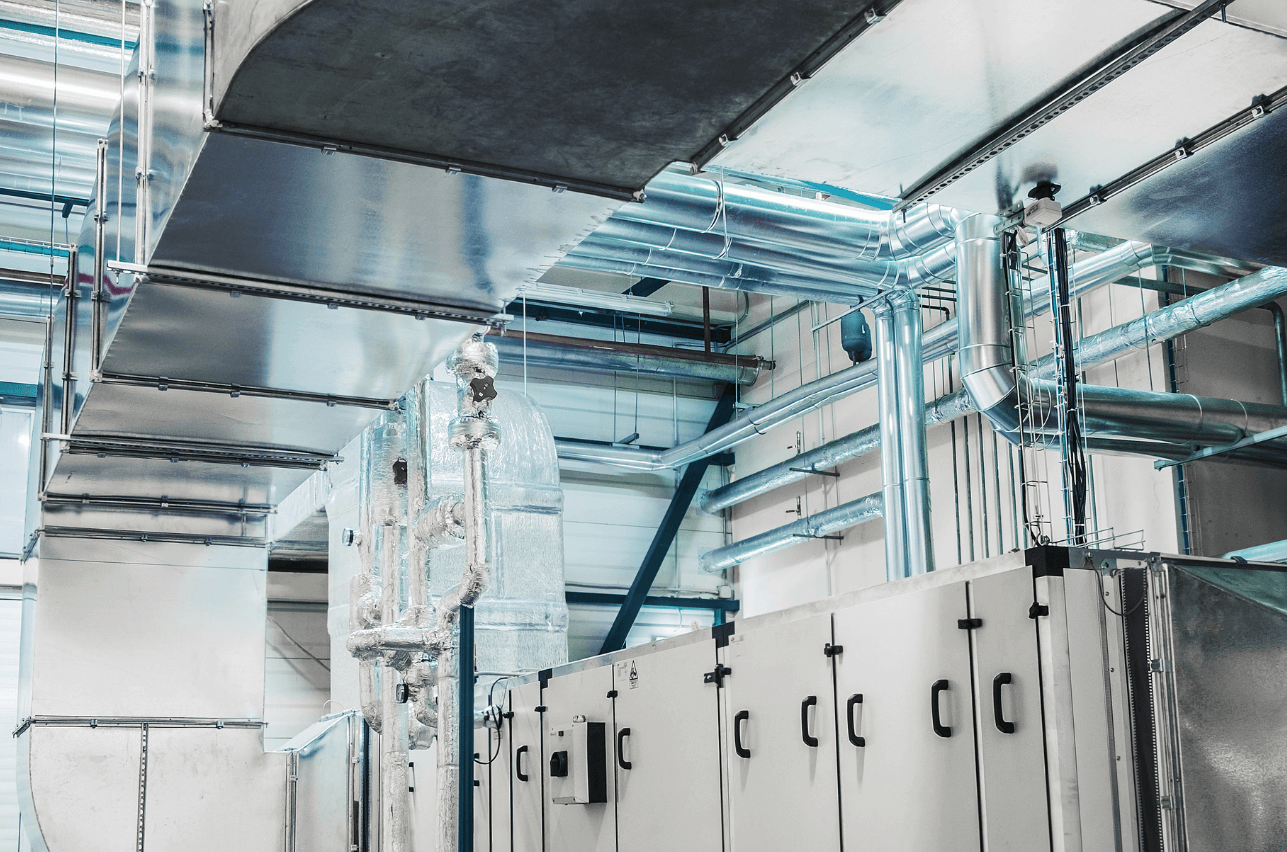 Professional commercial HVAC installation being completed in new office building construction project in Dubai UAE