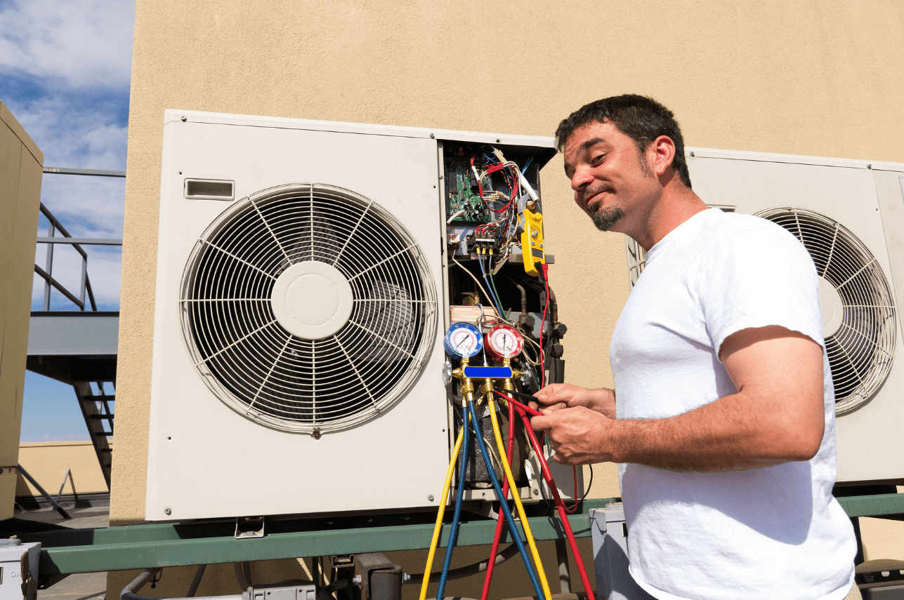 Planned annual AC maintenance service being performed on commercial air conditioning system in Dubai business premises